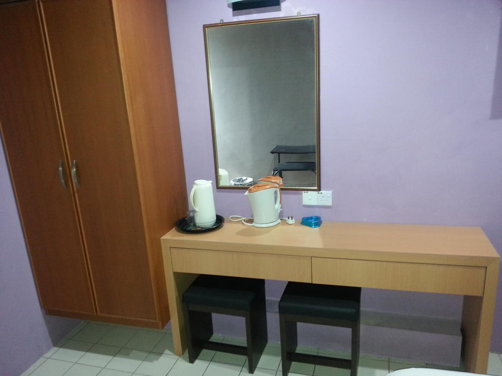 קוצ'ינג Oriental Inn חדר תמונה
